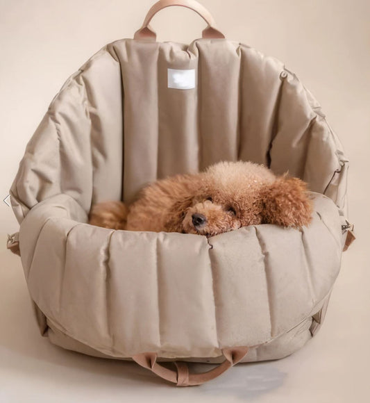 The Pet Dog Carrying Booster Seat provides a secure, elevated space for dogs during travel.